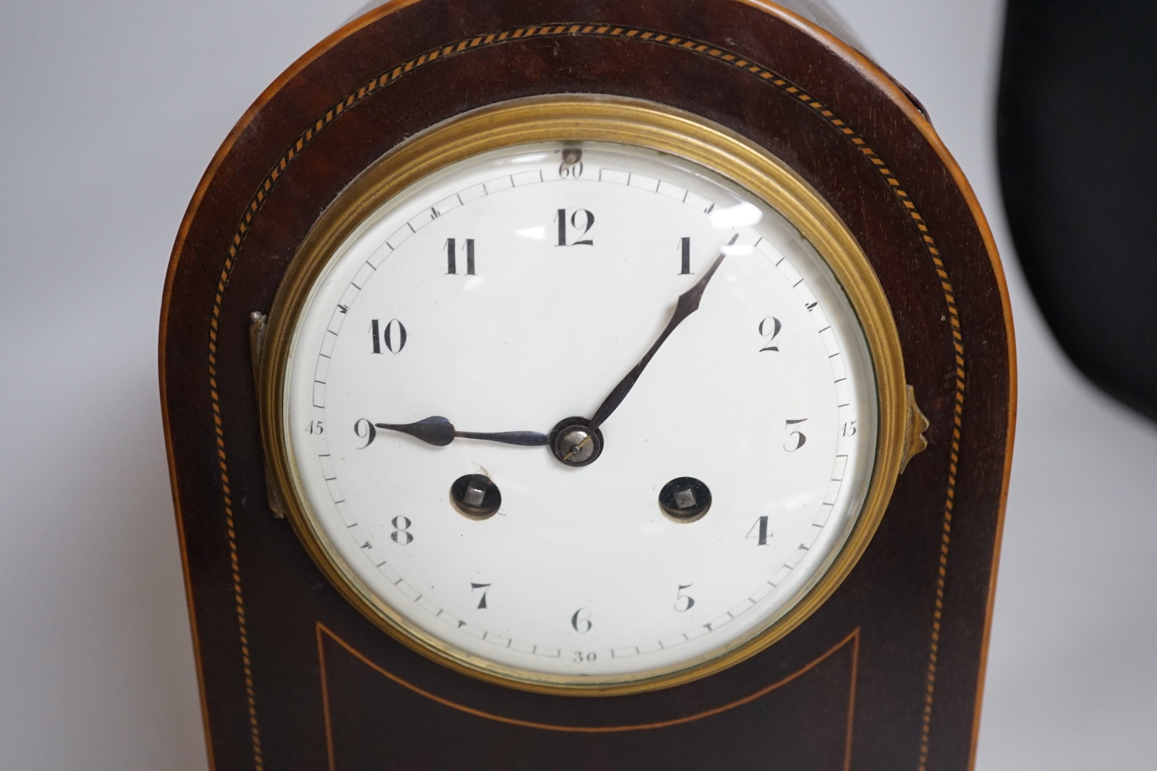 An Edwardian brass mounted mantel clock, 28.5cms high